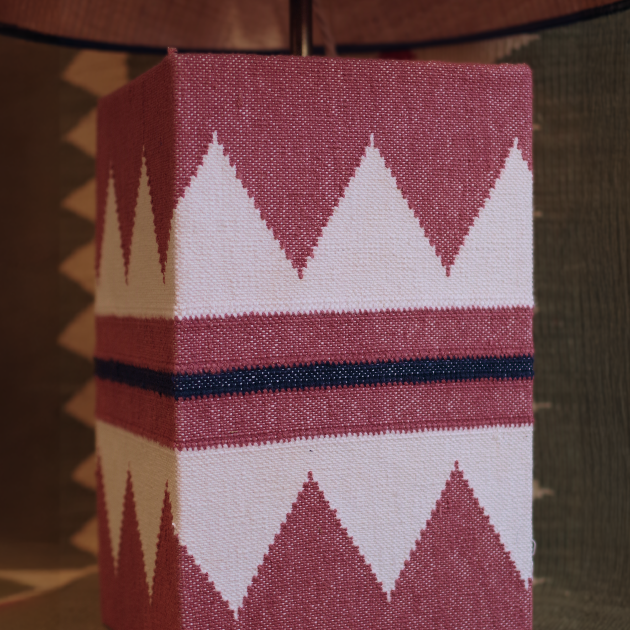 Zuri Raspberry Lamp - Close up agains green backgrounda