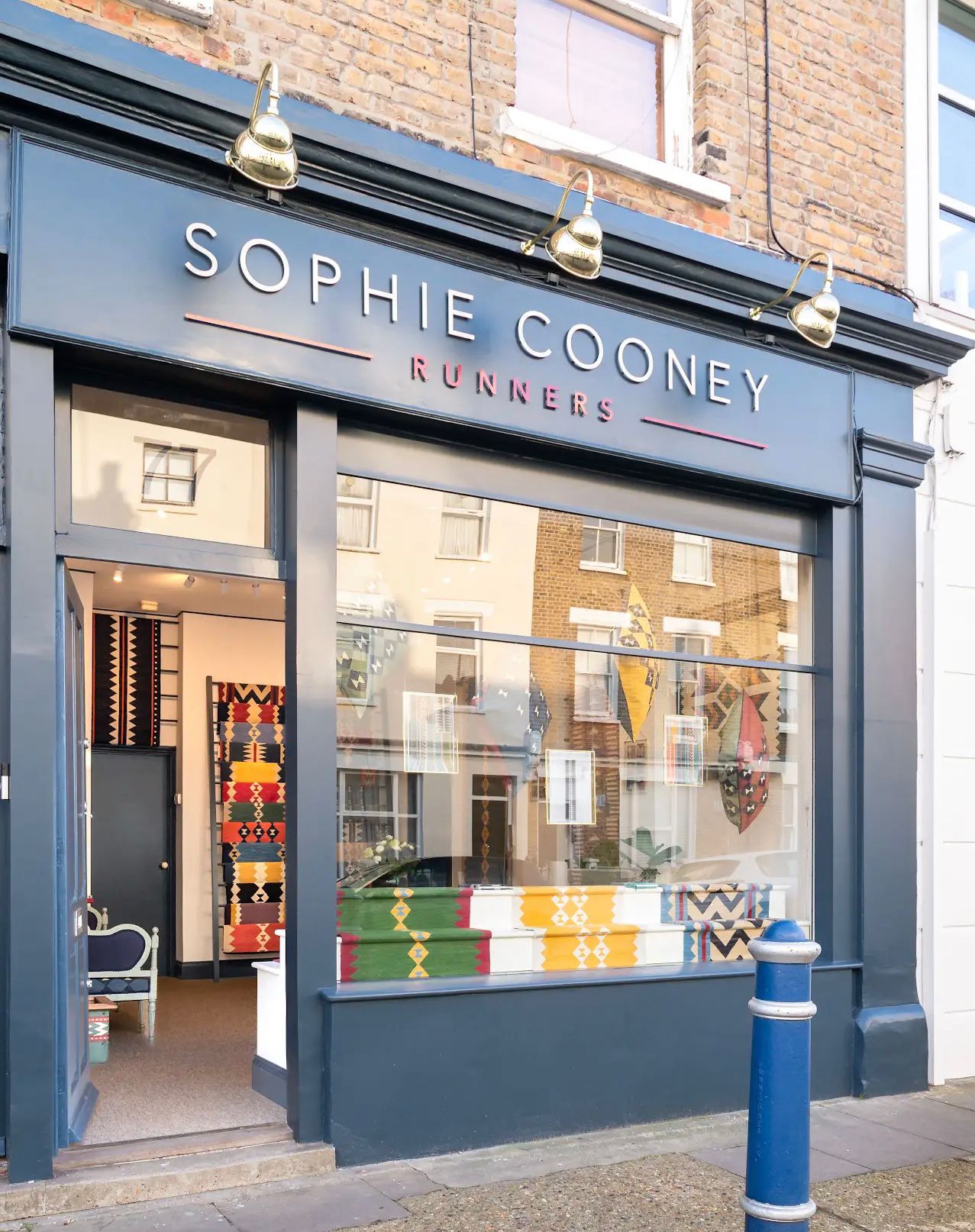 Sophie Cooney Runners Kensington Showroom with Window Display the home of luxury kilim style stair runners and rugs.